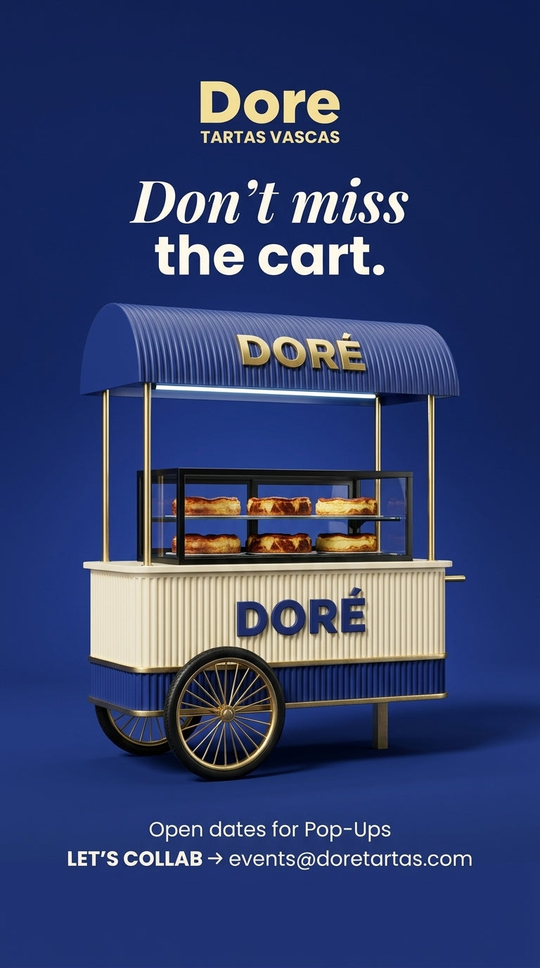 The Doré cart — blue, cream, brass spoke-wheels